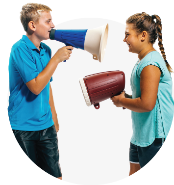 boy holding a megaphone with a girl holding a flashlight