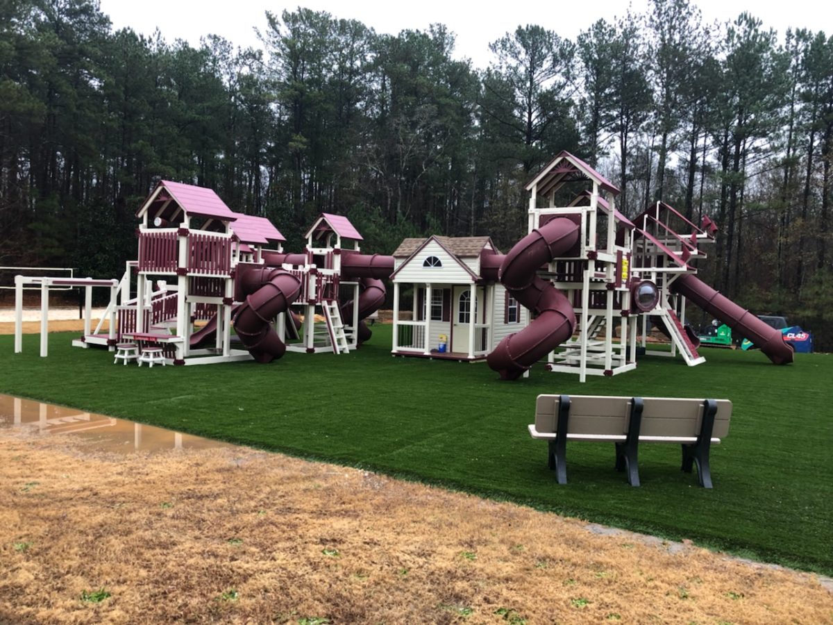 burgundy and white commercial playset with added playhouse