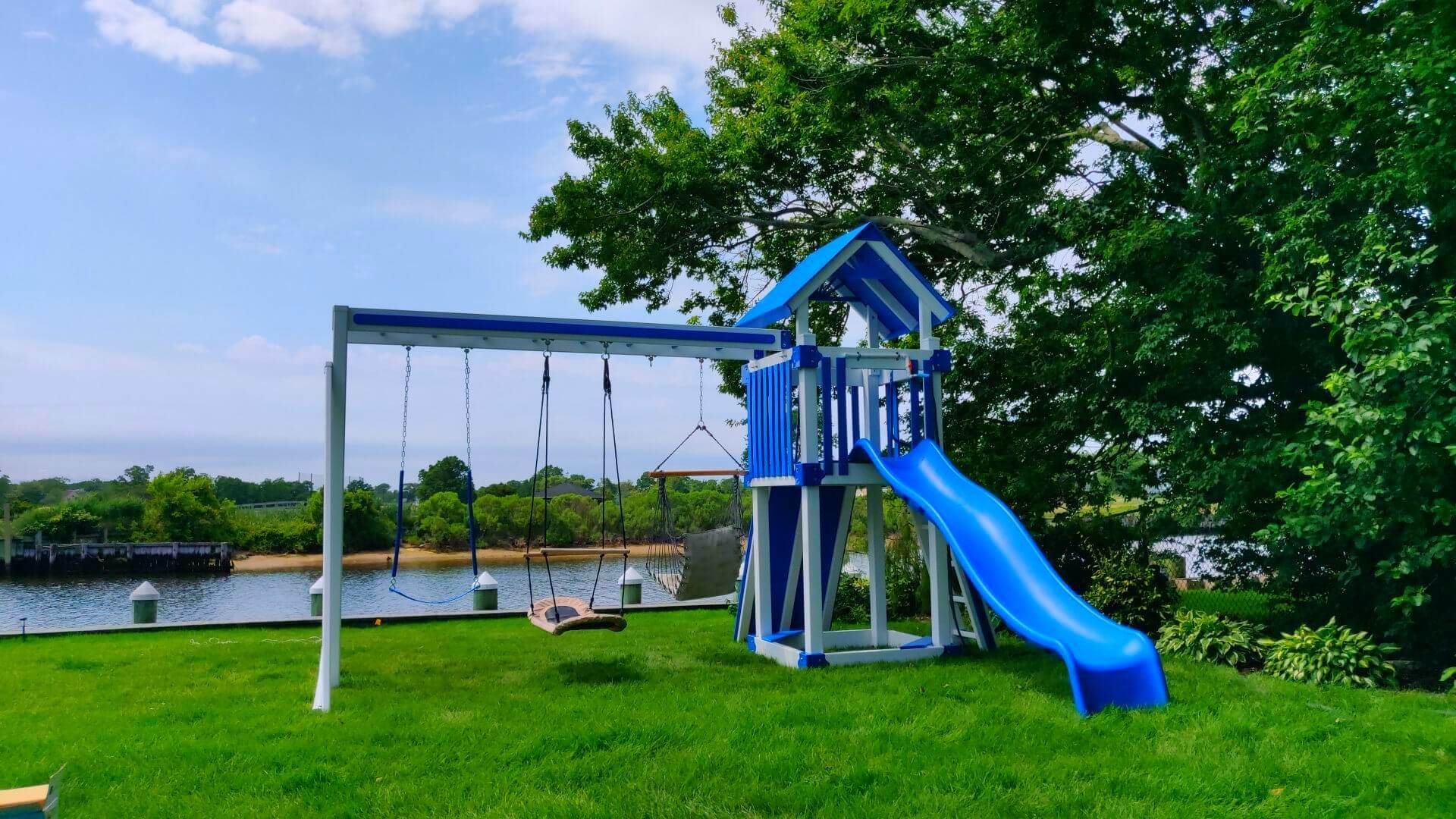 Blue playset with various swing add-ons